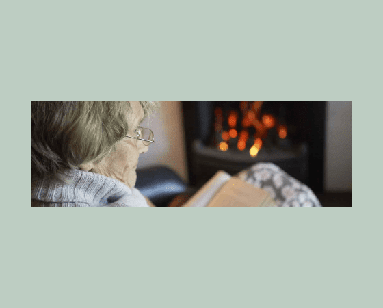 elderly woman reading