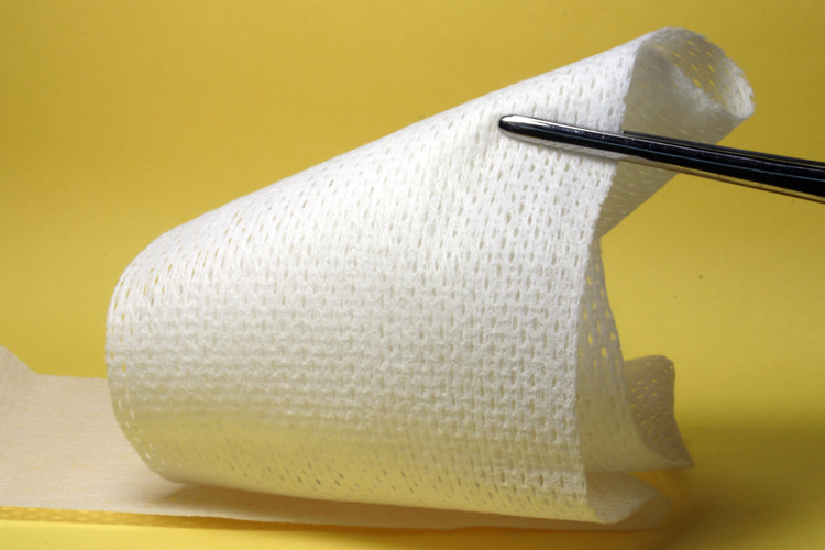 tweezers holding gauze bandage Someren Glen Senior Living Community in Centennial, CO - tweezers holding gauze bandage