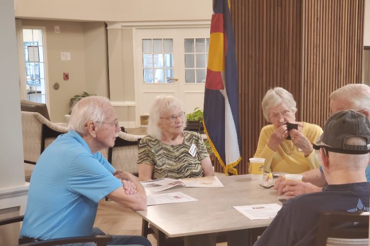 Residents talking over coffee