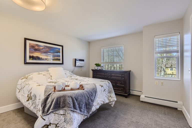 assisted living apartment primary bedroom 2 landscape