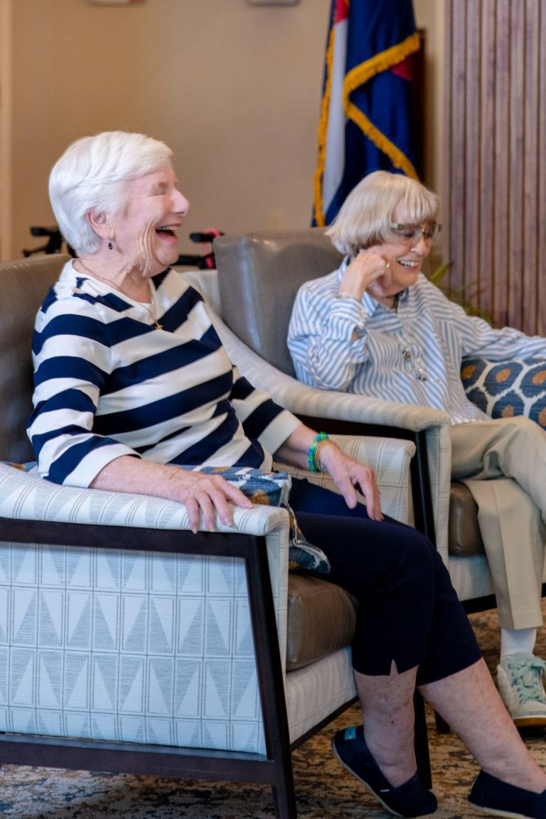 Someren Glen Senior Living Community in Centennial, CO - two older women laughing portrait