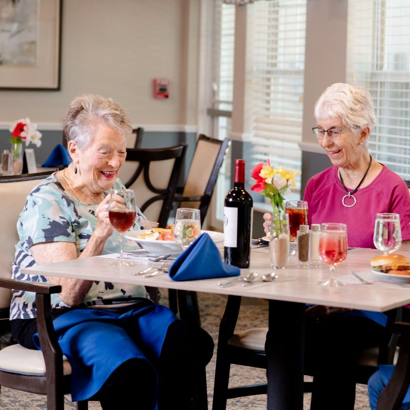 Someren Glen Senior Living Community in Centennial, CO - three older women talking over lunch square