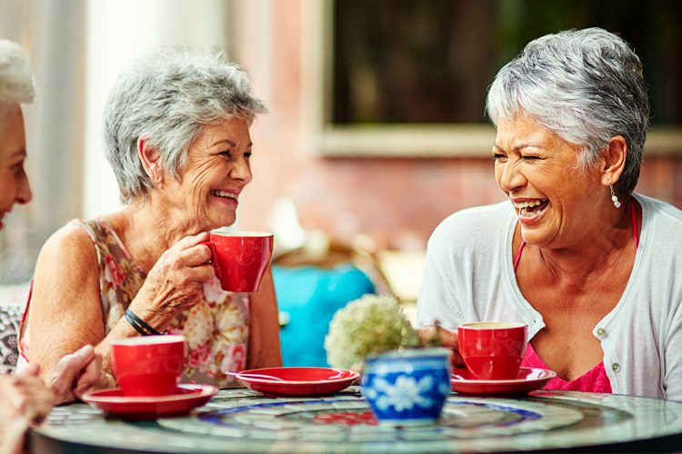Someren Glen Senior Living Community in Centennial, CO - senior women laughing over coffee