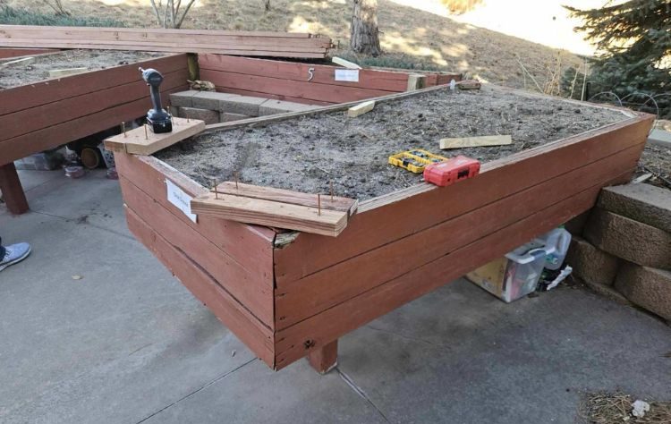 Someren Glen Senior Living Community in Centennial, CO - someren glen garden boxes being repaired