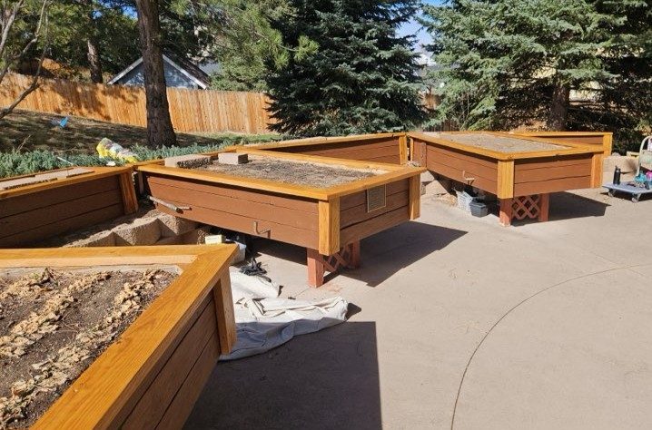 Someren Glen Senior Living Community in Centennial, CO - repaired garden boxes at someren glen