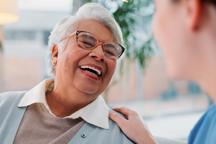 Someren Glen Senior Living Community in Centennial, CO - senior adult woman with caregiver